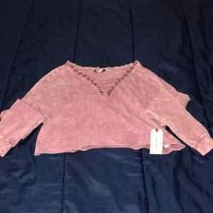 Cropped shirt with crosses on the chest